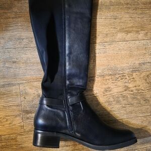 Sleek Black Leather Heeled Boots